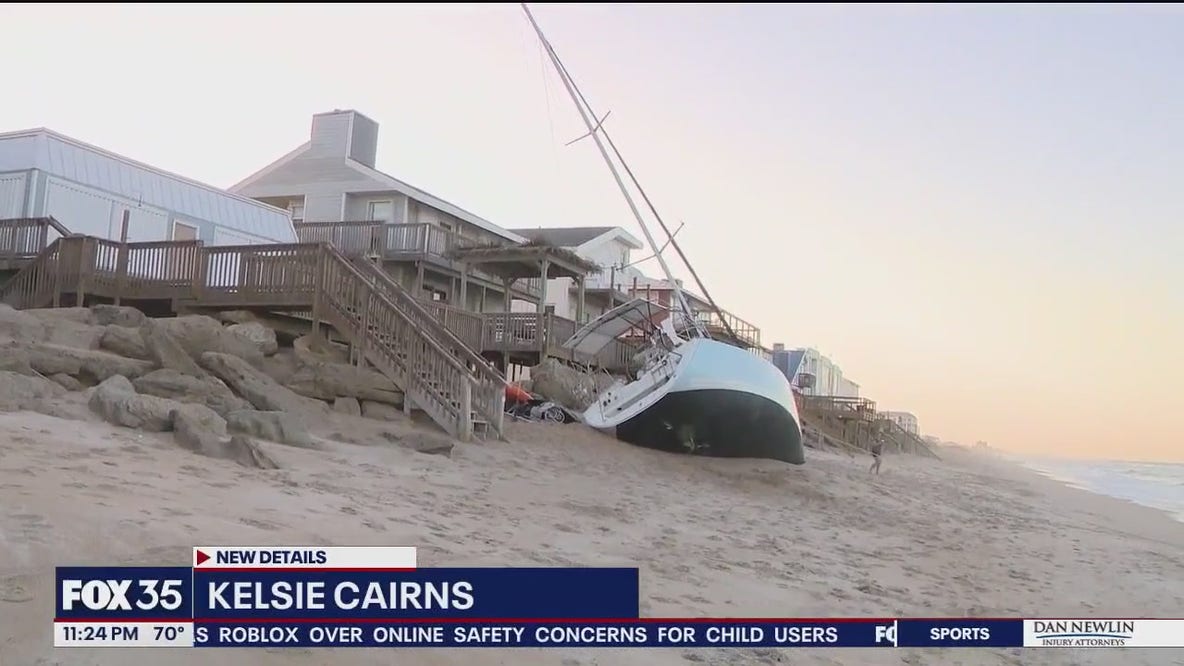Sailboat marooned on New Smyrna Beach